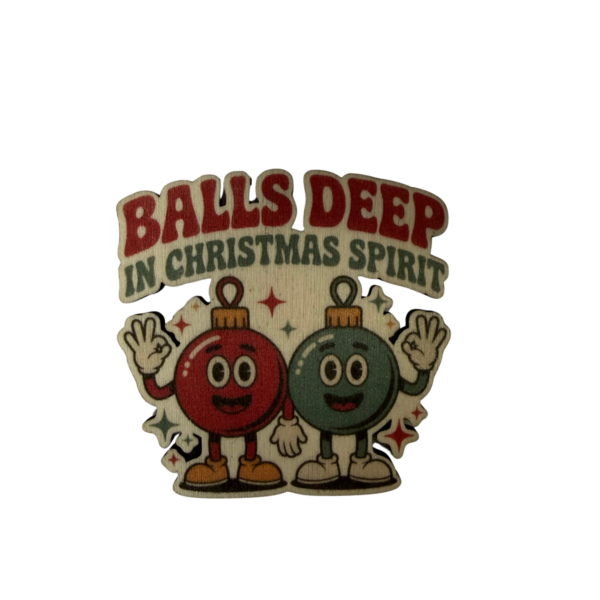Wooden magnet with smiling red and green baubles and Balls Deep in Christmas Spirit lettering on a white background.