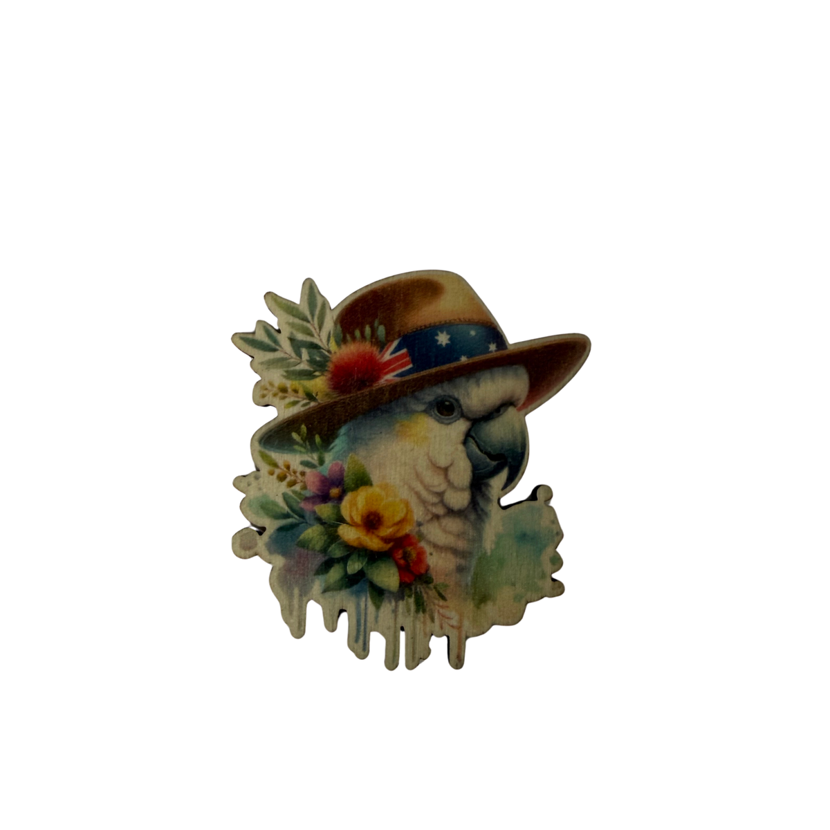Wooden cockatoo magnet featuring a cockatoo in a broad-brimmed hat surrounded by flowers and foliage