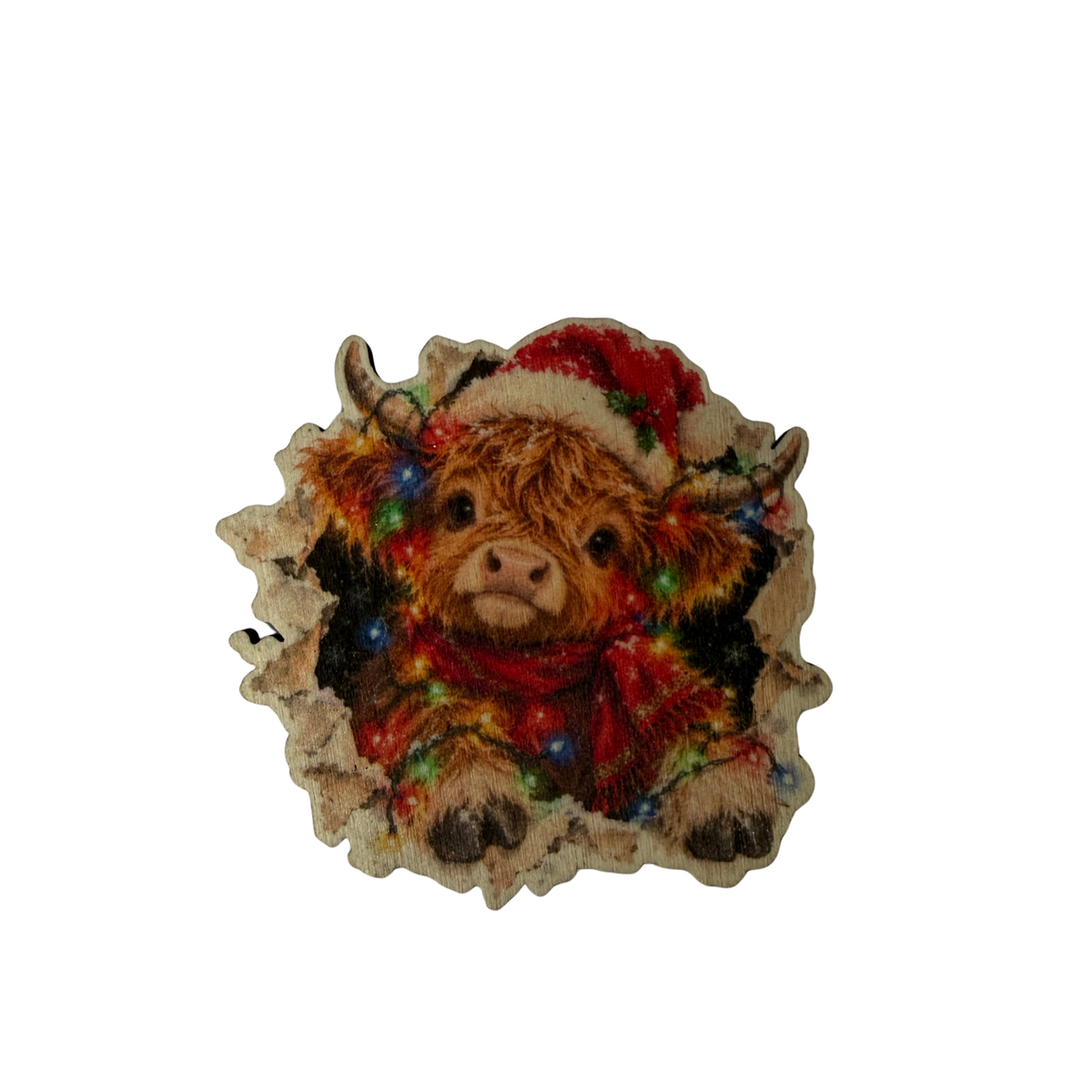 Wooden Highland cow Christmas magnet with a red Santa hat and scarf and colourful illustrated Christmas lights on a white background.