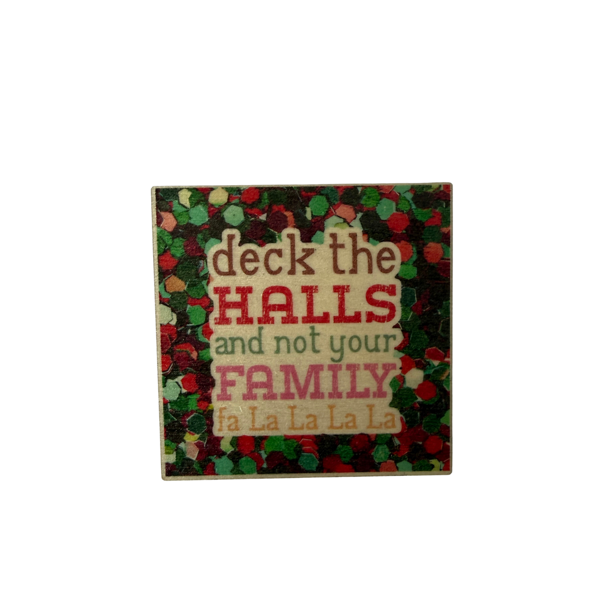 Square wooden Christmas magnet with Deck the Halls and Not Your Family lettering and a colourful red and green background.