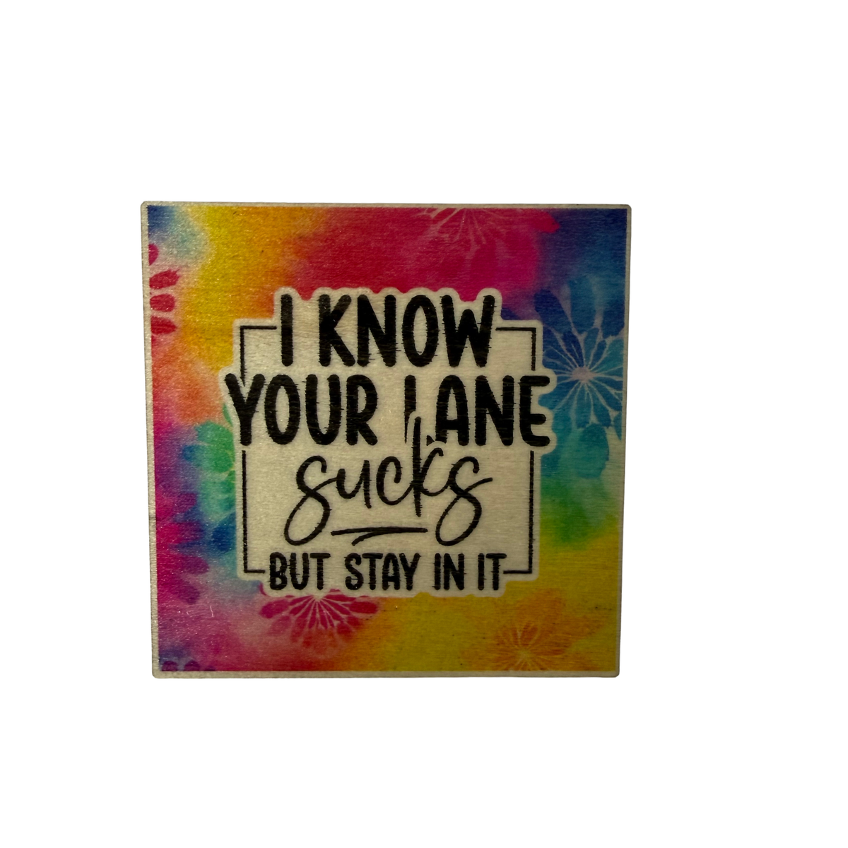 Square Your Lane magnet with I Know Your Lane Sucks But Stay in It lettering on a bright multicoloured background with floral details.