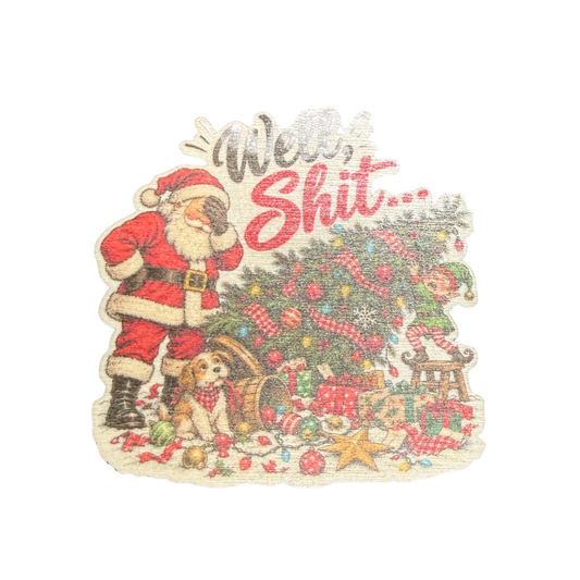 Well, Shit wooden Christmas magnet featuring a facepalming Santa beside a toppled Christmas tree and scattered decorations