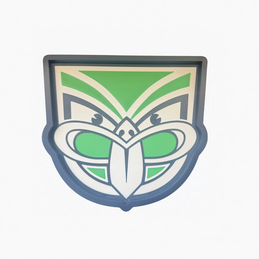 New Zealand Warriors trinket tray in green, white and dark colours on a white background