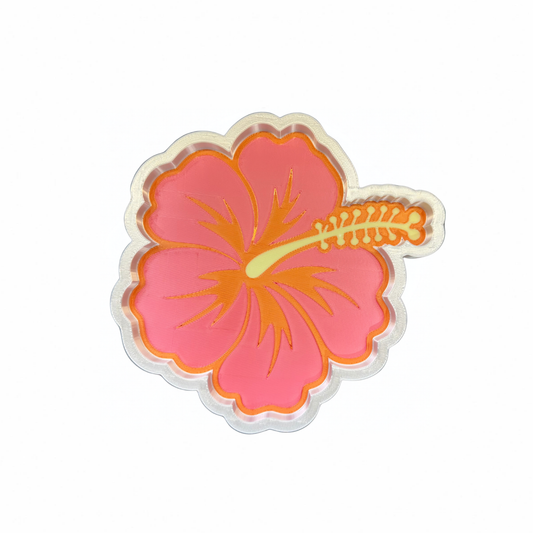 Pink hibiscus flower-shaped trinket tray with a yellow centre on a white background