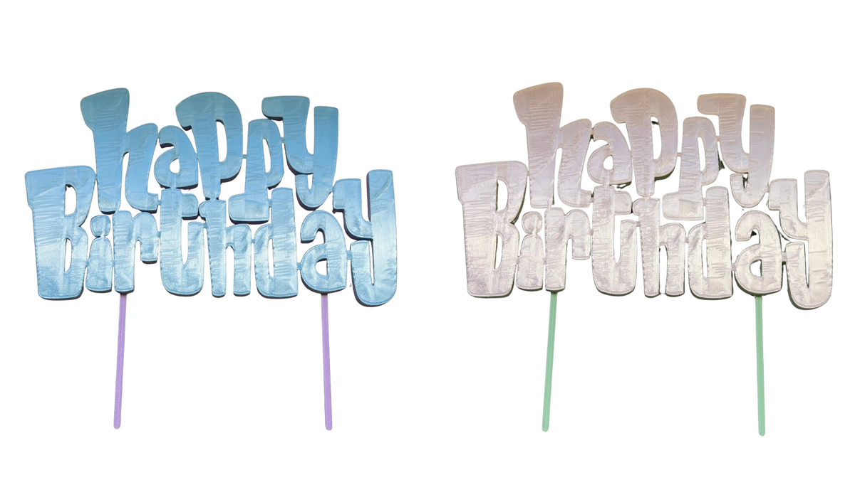 Happy Birthday 3D printed cake topper in blue and pearl colour options, on white background