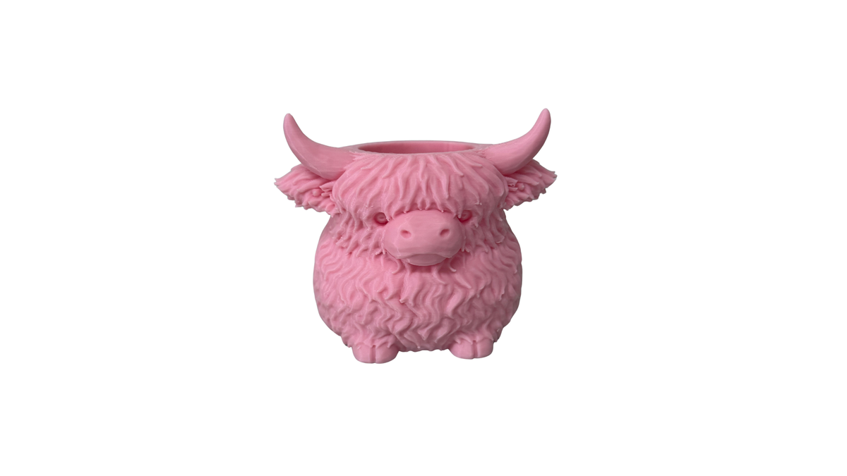 Pink 3D printed highland cow desk organiser pen holder, on white background