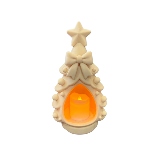 Christmas tree LED tealight holder with a star topper and bow, illuminated by an LED tealight